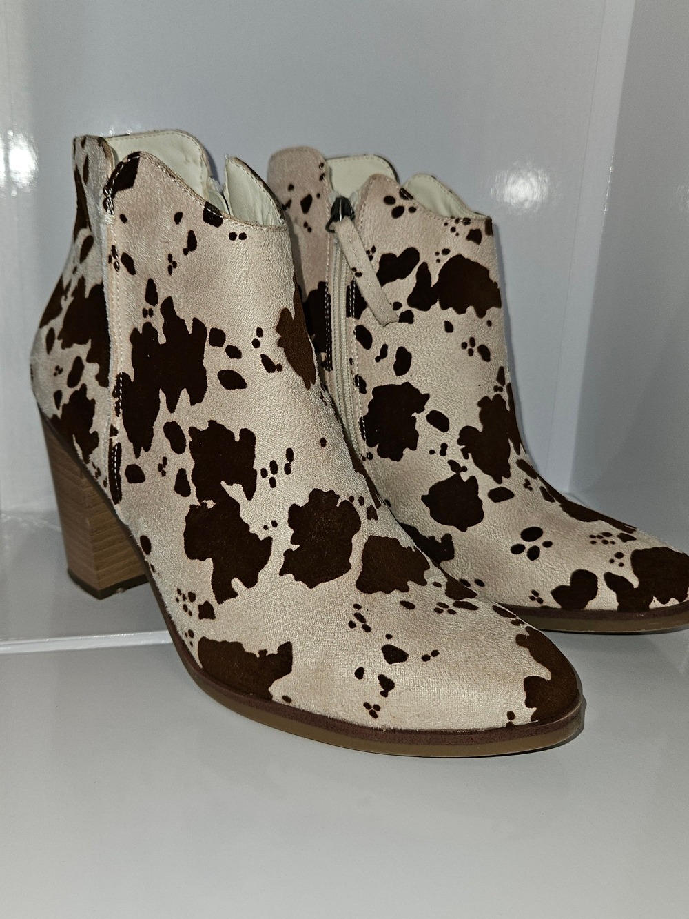 Maurices Cow Print Ankle Booties in Cream & Brown